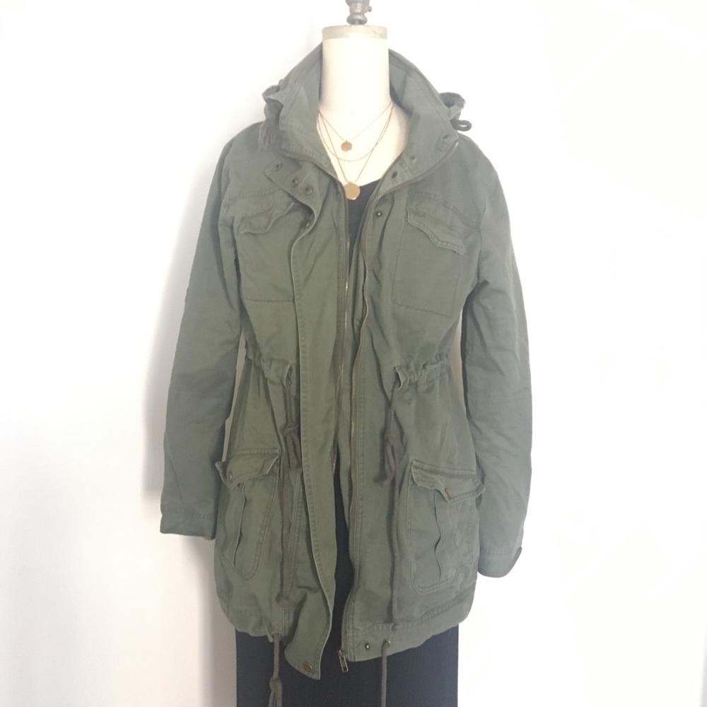 Utility camo green jacket with tie adjustments